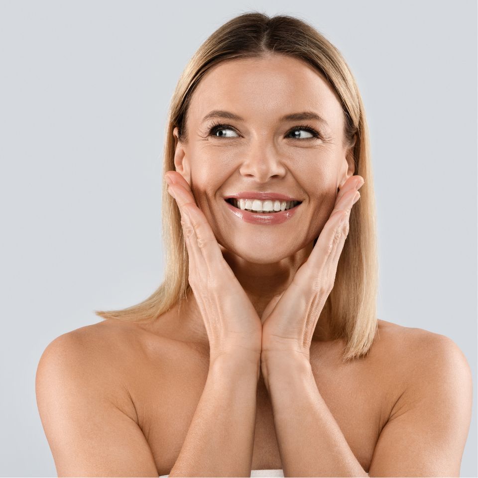 woman showing results of facial treatments in nottingham