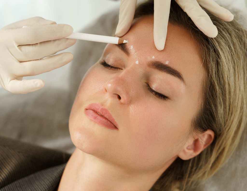woman having botox treatment by aesthetics company in Nottingham